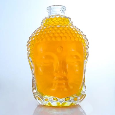 Customized buddha shaped 700ml 750ml clear vodka rum liquor glass bottle with cork cap