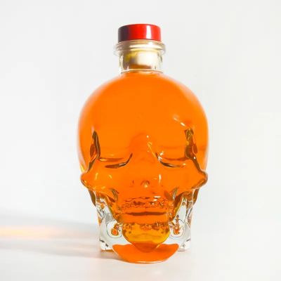 Hot sale skull shapes super flint glass liquor bottle spirit 750ml whisky clear vodka brandy beverage tequila mezcal with lid