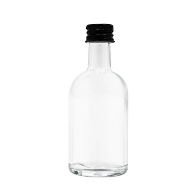 wholesale Custom 50ml 100ml whisky vodka and rum wine transparent round glass bottle