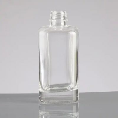 Wholesale high quality square refinement 500ml liquor glass bottle with cap