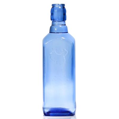 Custom Premium Blue color Glass Bottles With Swing Top Cap For Vodka Spirits
