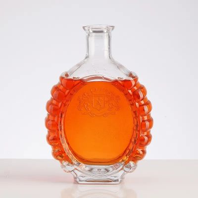 Wholesale 500ML ultra clear blank brandy glass bottle with embossed logo