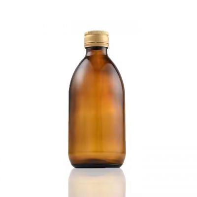 wholesale 60ml 125ml 150ml 200ml empty amber round medical syrup glass bottles with gold cap Oral liquid