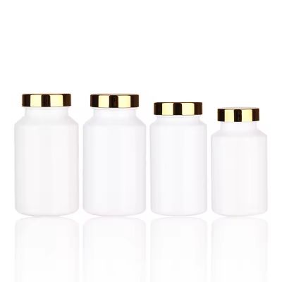 Wholesale Empty Custom White Plastic Pil Medicine Tablet Capsule Container Bottle With Gold Screw Cap