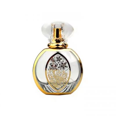 Arabic Gold Oud Custom Engraving 50ml Oblate Fancy Attar Crystal Glass Perfume Essential Oil Bottles Spray Pump Sub-Bottling