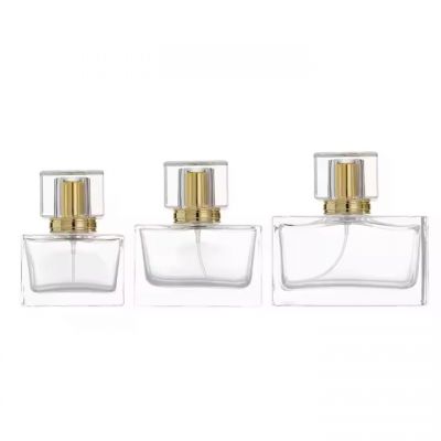 Hot Selling Empty Crimp Neck Perfume Bottles 30ml 50ml 100ml Stock Fragrance Perfume Spray Glass Bottle with Square Acrylic Cap