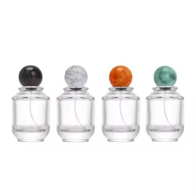 Luxury 100ml Round Cylinder Transparent Spray Glass Perfume Bottle Empty Unique Press Type Perfume Bottles With Resin Ball Caps