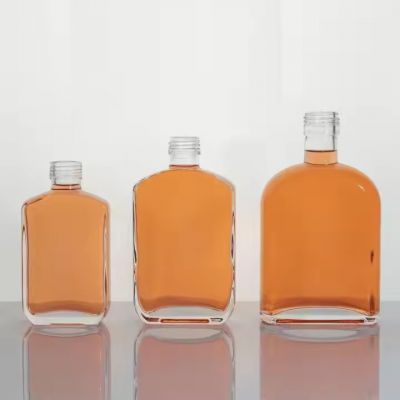 Dumpy Shape Small Bottle of Gin Tequila Bottle for Bulk Sale Good Quality 100ml 200ml 300ml Glass Brandy Bottle