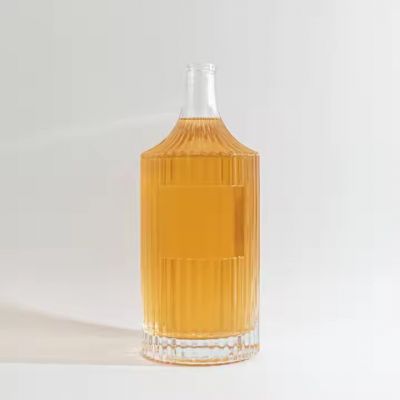 Recyclable Customized Weight 850g 1000ml Embossed Vertical Glass Bottle with Label Area for Spirits Tequila Vodka