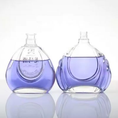 Wholesale Round Stocked 200ml 500ml 375ml Extra Flint Glass Bottle With Metal Stopper Screw Cap for Gin Vodka Rum Liquor Spirits