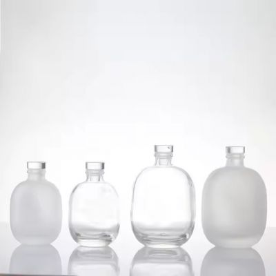Wholesale New Water Droplets Shape Empty Transparent Whisky Vodka Bottle Round Liquor Glass Gin Rum Bottles