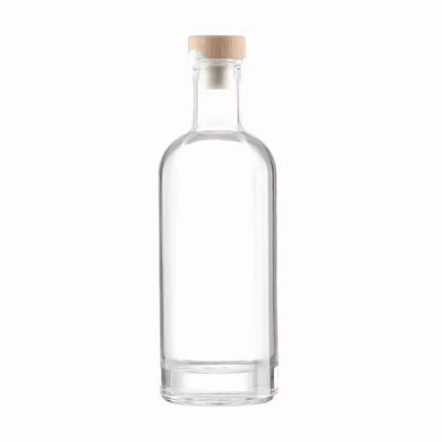 Customized 700ML/750ML Clear Glass Bottles with Spray Cap Cork Sealing for Olive Oil Vodka Brandy Tequila