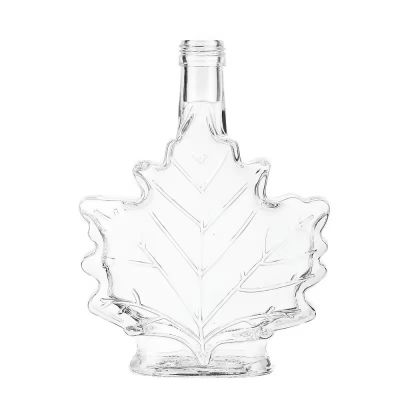 Factory High Quality Customized Logo Leaf Shaped Clear Empty Super Flint Glass Bottle Brandy Tequila Whiskey Bottle