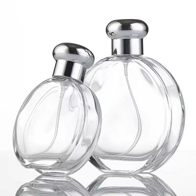 High Quality Glass Perfume Bottle 50ml 100ml Empty Round Shape Parfum Bottle with Sliver Cap Custom Logo