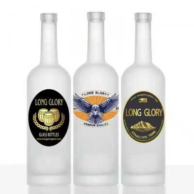 Wholesale 750 ml Empty Round Super Flint Glass Cork Whiskey Brandy XO Bottle with Frost and Color Spray